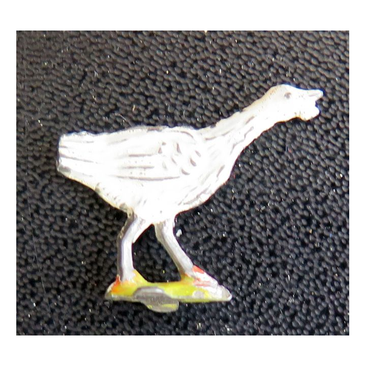 SOLDAT DE PLOMB : petite poule en fer blanc peinte queue tronquée
