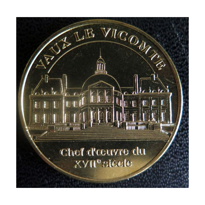 Médaille souvenir en métal doré de Vaux Le Vicomte diamètre 3,4 cm