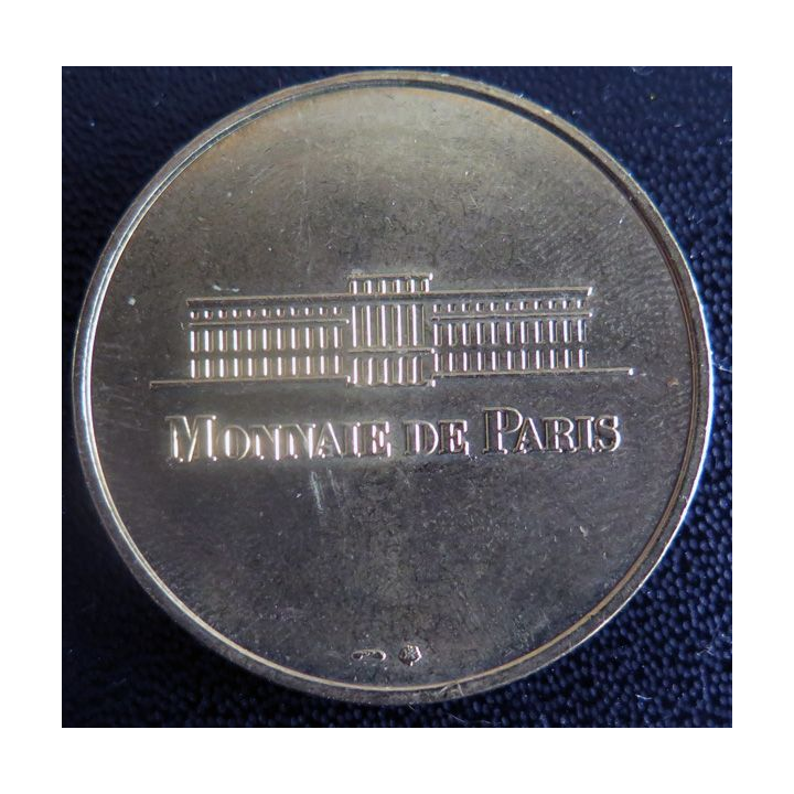 Médaille souvenir en métal doré de Notre Dame Paris diamètre 3,4 cm