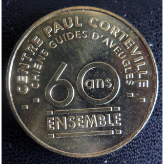 Médaille souvenir en métal doré des 60 ans du centre Paul Corteville diamètre 3,4 cm