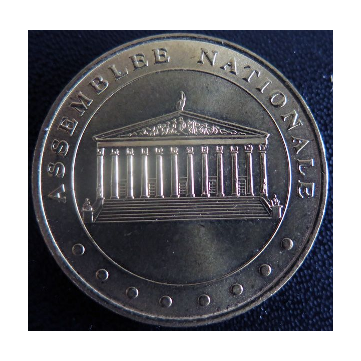 Médaille souvenir en métal doré de l'Assemblée Nationale diamètre 3,4 cm