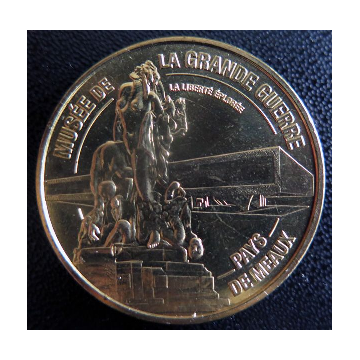 Médaille souvenir en métal doré du Musée de la Grande Guerre Meaux diamètre 3,4 cm