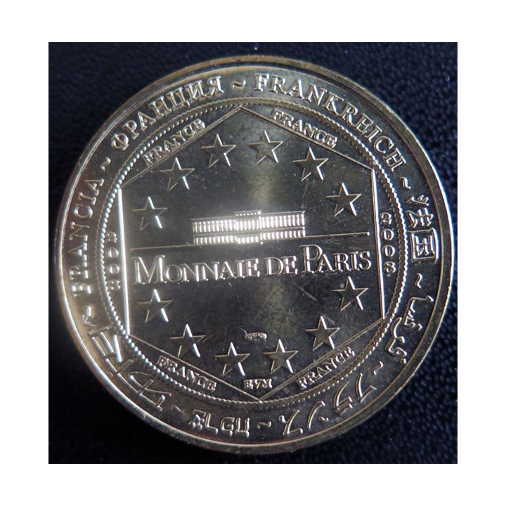 Médaille souvenir en métal doré de la Collégiale Saint Pierre diamètre 3,4 cm