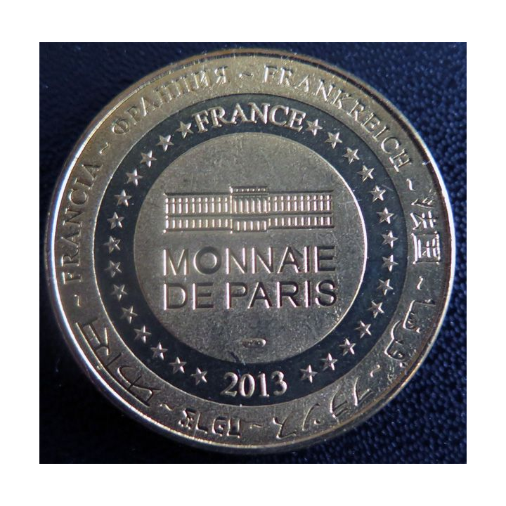 Médaille souvenir en métal doré du Musée d'Arromanches diamètre 3,4 cm