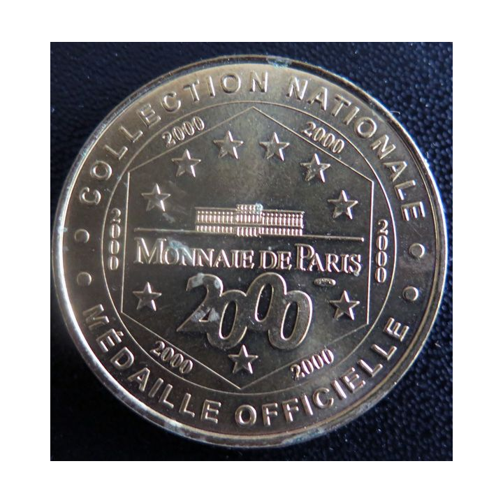 Médaille souvenir en métal doré de l'Office du Tourisme et des Congrès Paris diamètre 3,4 cm