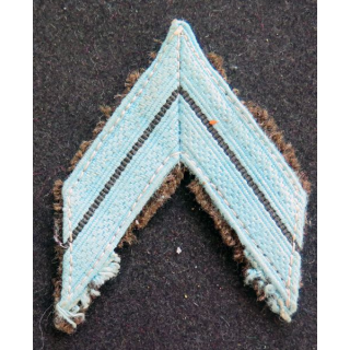 Galon de Caporal appelé bleu clair sur fond kaki