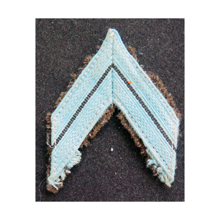 Galon de Caporal appelé bleu clair sur fond kaki