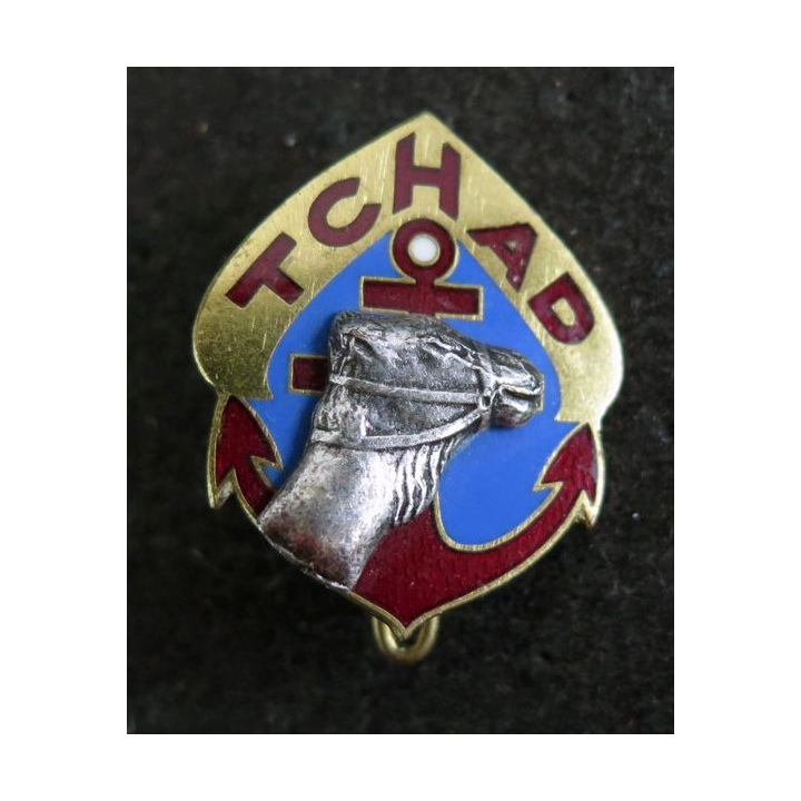 RMT : insigne métallique du régiment de marche du Tchad de fabrication Drago H. 181 relief