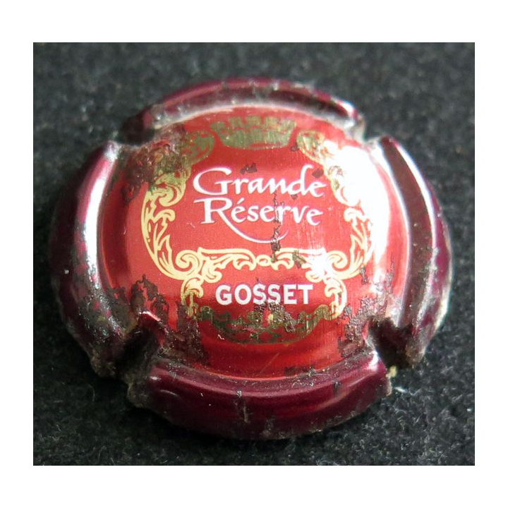 Capsule Muselet de bouteille de champagne GOSSET n° 31 Rouge et or (tâché)