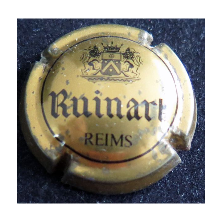Capsule Muselet de bouteille de champagne RUINART n° 44e or foncé et noir (tâché)