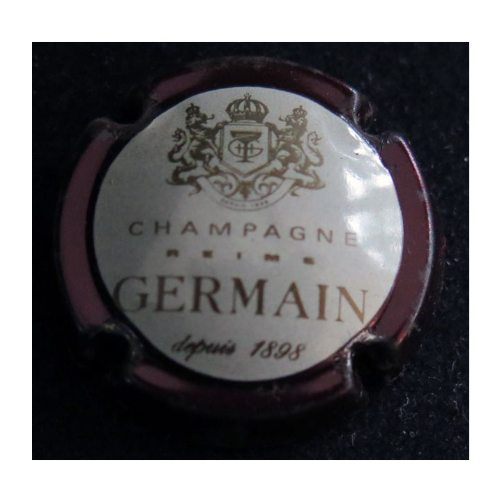 Capsule Muselet de bouteille de champagne GERMAIN H. n° 28 contour marron