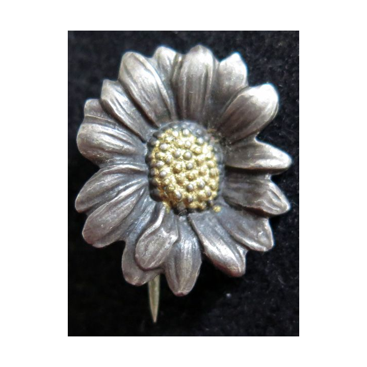 Vieille Broche en argent Marguerite de MELLERIO hauteur 2 cm
