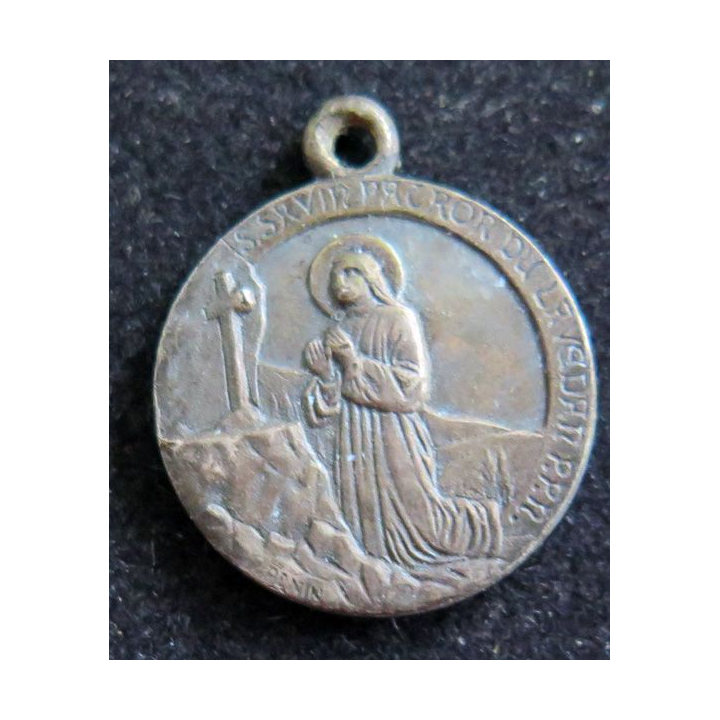médaille religieuse en métal  argentée de Saint Savin diamètre 1,8 cm