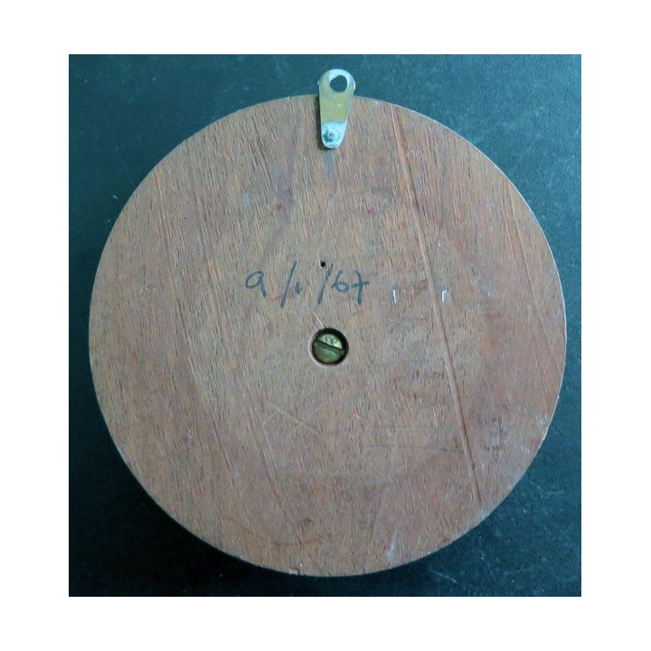 BRETAGNE : Tape de bouche en bronze d'unejeune breton diamètre 12 cm