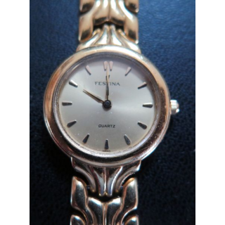 Montre Vintage femme FESTINA en métal doré (plaqué or ?)