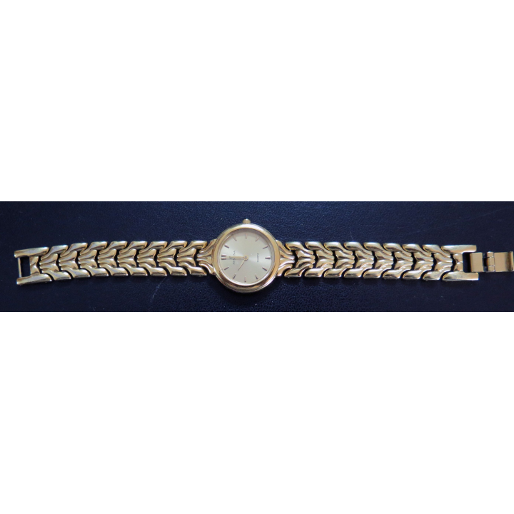 Montre Vintage femme FESTINA en métal doré (plaqué or ?)