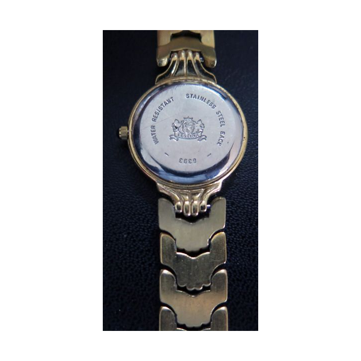 Montre Vintage femme FESTINA en métal doré (plaqué or ?)