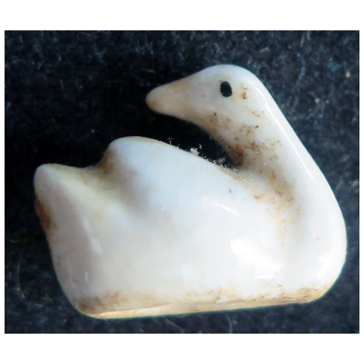 Fève cygne en porcelaine