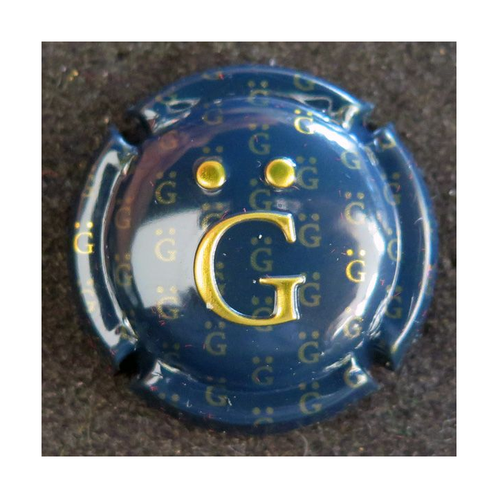 Capsule Muselet de bouteille de champagne GIRAUD Henri n° 18 estampée bleu noir et or