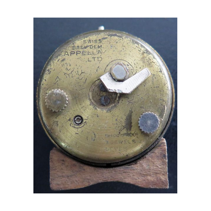 Petit réveil swiss Brev Dem Appela LIP sur socle bois  4 cm de diamètre