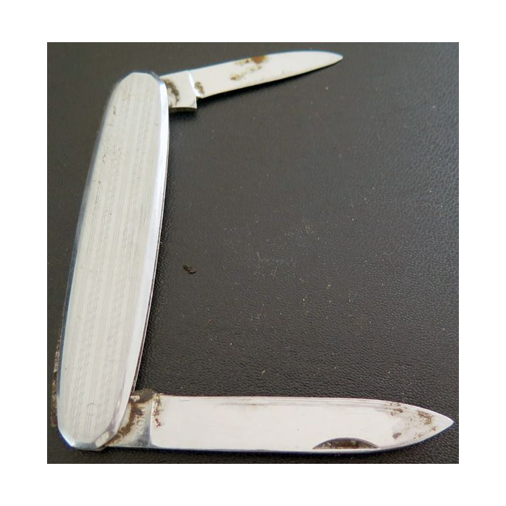 Couteau de poche argenté type cure ongle 8 cm de long