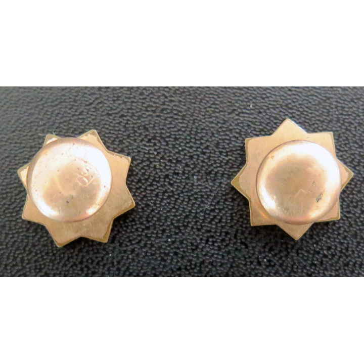 Paire de boutons de manchette cuivrés