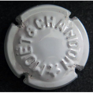 Capsule Muselet de bouteille de champagne MOET ET CHANDON n° 106 Estampée, (grand &) étoile pointe en bas