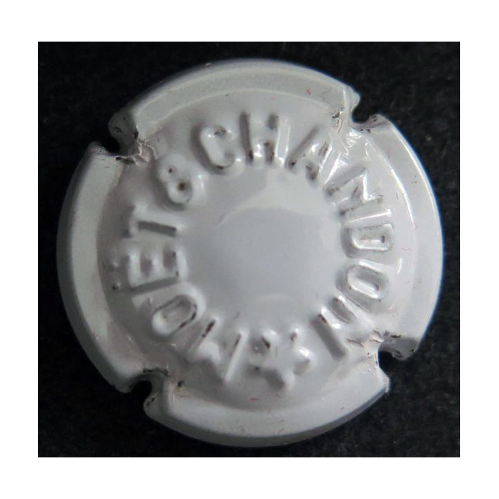 Capsule Muselet de bouteille de champagne MOET ET CHANDON n° 106 Estampée, (grand &) étoile pointe en bas