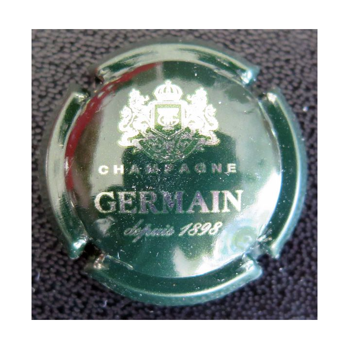 Capsule Muselet de bouteille de champagne GERMAIN H. n° 33f quart vert foncé et métal