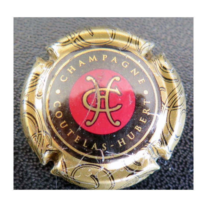 Capsule Muselet de bouteille de champagne COUTELAS Hubert n° 9 Contour or cercle noir