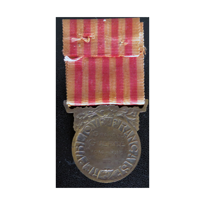 FRANCE : médaille commémorative de la Grande guerre 1914-1918 en bronze ruban déteint