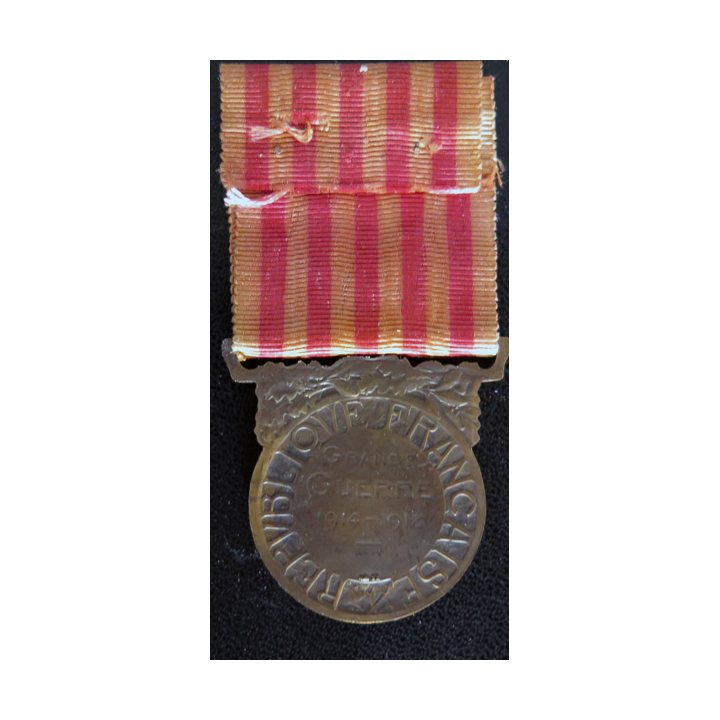 FRANCE : médaille commémorative de la Grande guerre 1914-1918 en bronze ruban déteint