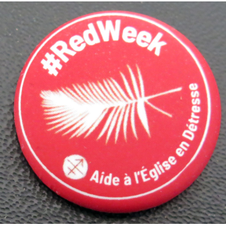 Boutonnière Redweek sur l'Aide à l'Eglise en détresse
