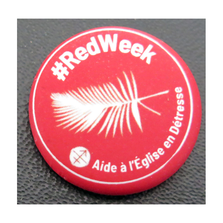Boutonnière Redweek sur l'Aide à l'Eglise en détresse