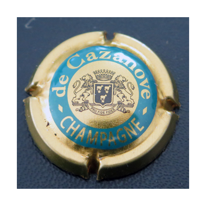 Capsule Muselet de bouteille de champagne De CAZANOVE n° 14 cercle et contour or foncé, C ouvert, dessin fin