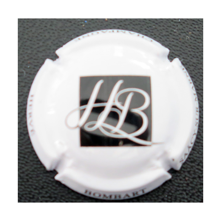 Capsule Muselet de bouteille de champagne BOMBART Hervé n° 7b Blanc et noir, accent sur E