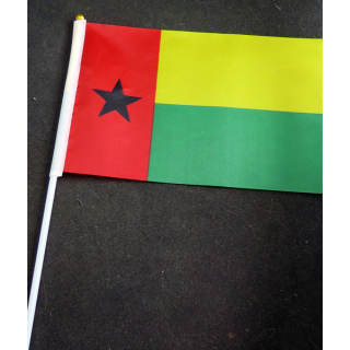 Petit drapeau à main de la Guinée-Bissau fixé sur une hampe en plastique blanc 20 x 13,5 cm