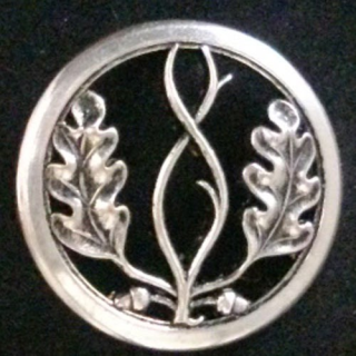 insigne de béret du Trésor aux armées de fabrication Coinderoux