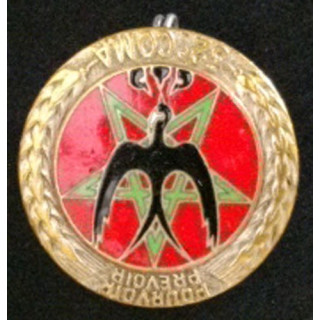 Cet insigne de la 32° section des commis ouvriers militaires d'administration est fabriqué par Drago Paris Rue Béranger