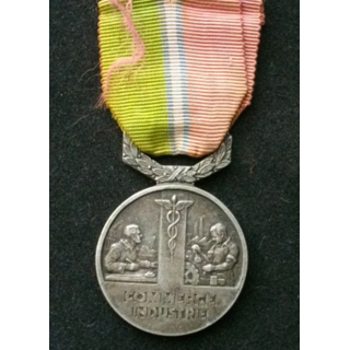 FRANCE : médaille du syndicat général du commerce et de l'industrie attribuée en 1949 à Mme C. Maire en bronze argenté