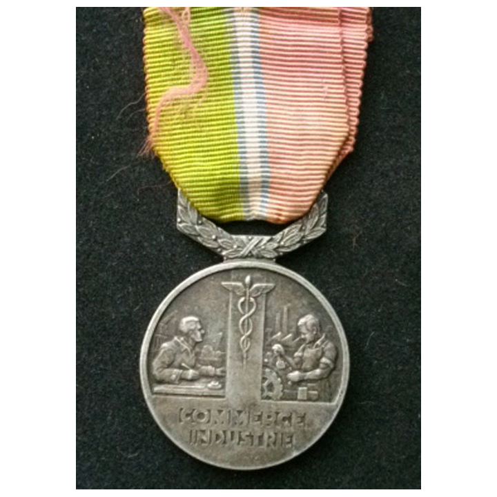 FRANCE : médaille du syndicat général du commerce et de l'industrie attribuée en 1949 à Mme C. Maire en bronze argenté