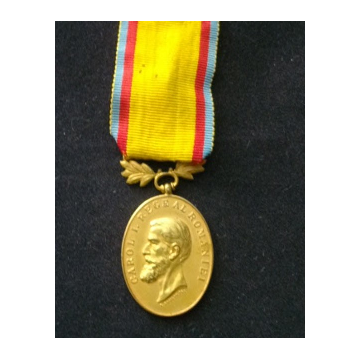 ROUMANIE : médaille de Carol Ier en bronze doré sans épées avec comme légende au dos "Barbatie si Crédinta"