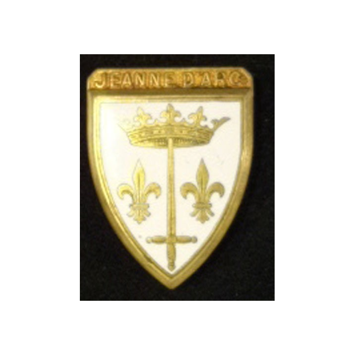 Insigne métallique du croiseur Jeanne d'Arc de fabrication Courtois