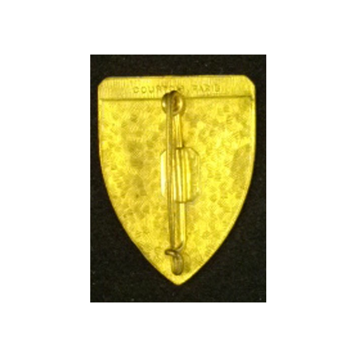 Insigne métallique du croiseur Jeanne d'Arc de fabrication Courtois