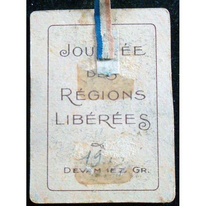 Insigne cartonné de la journée nationale des régions libérées