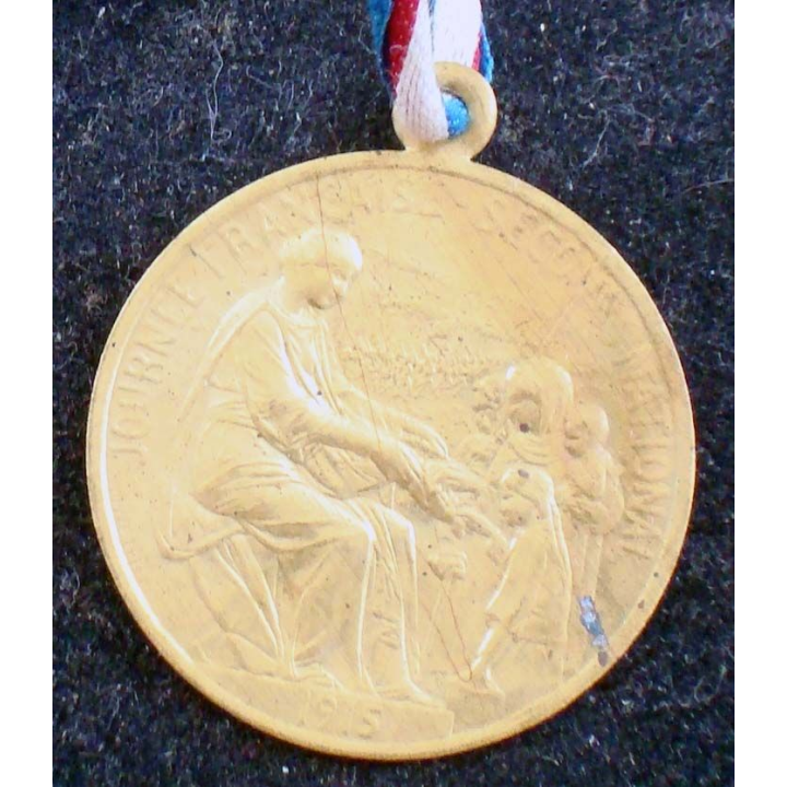 Médaille en métal embouti de la journée française de secours national