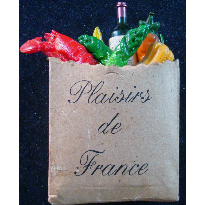 Magnet frigo plaisir de France représentant un sac rempli de provisions françaises