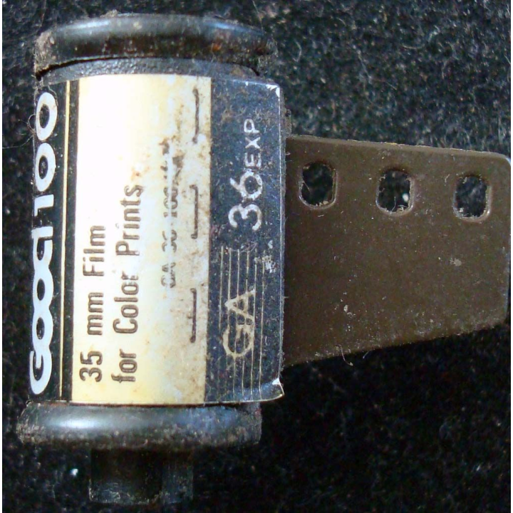 Magnet frigo représentant une bobine de film sunnycolor good 100