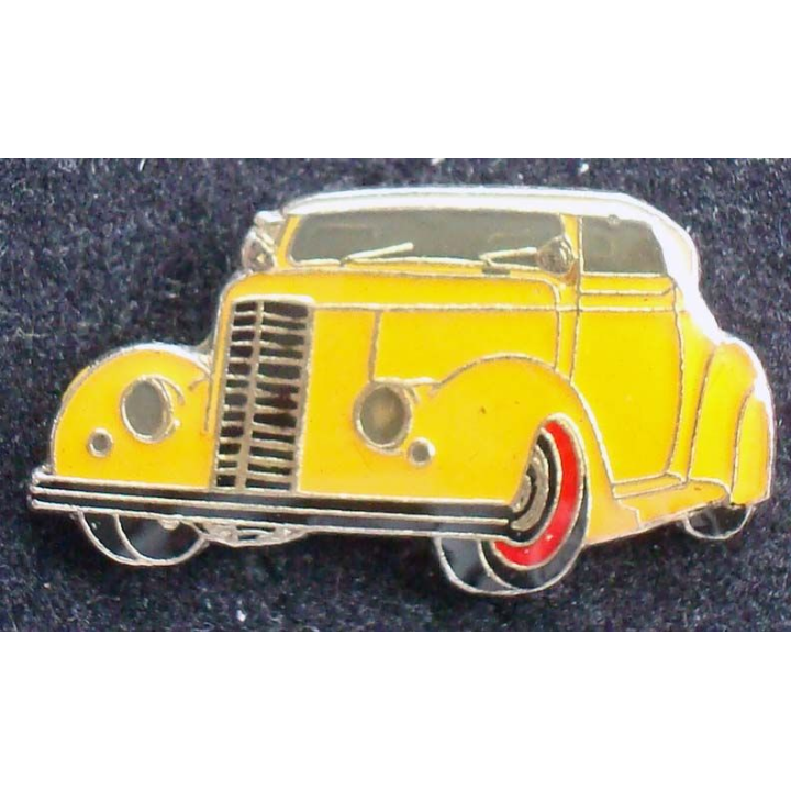 Pin's automobile : pin's représentant une vieille voiture