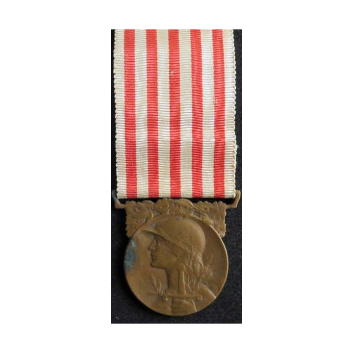 FRANCE : médaille commémorative de la Grande guerre 1914-1918 en bronze ruban défraichi